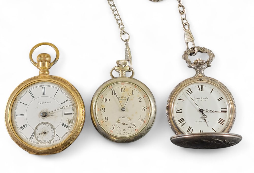 THREE POCKET WATCHES: American, late 19th-early 20th century. One Rockford, open-faced with etched decoration on the back. One Ingersoll Junior in silver-tone case. One Andre Rivalle in hunter's case with embossed hunting 