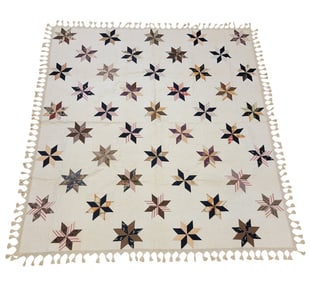 EIGHT-POINT STAR APPLIQUE QUILT WITH TASSELS