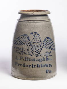 EAGLE-DECORATED STONEWARE CANNING JAR: A.P. Donaghho, Fredericktown, Pennsylvania, late 19th century. With stenciled eagle and shield decoration. 10" high. Provenance: the collection of the late Jo Louise Brown, Zoar, Ohio. In-house shippi