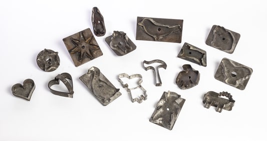 COLLECTION OF SIXTEEN TIN COOKIE CUTTERS