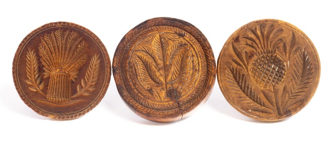 THREE CARVED BUTTER MOLDS