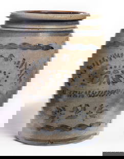 TWO-GALLON GREENSBORO STONEWARE JAR: Hamilton and Jones, Greensboro, Pennsylvania, late 19th century. With stenciled decoration and freehand stripes. 12" high. Provenance: the collection of the late Jo Louise Brown, Zoar, Ohio. In-house