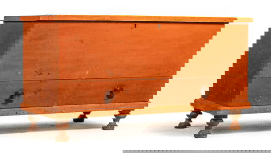 BLANKET CHEST: American, 1830-1840, cherry. Blind dovetailed case with two drawers and turned feet. 26.5" high, 49" wide, 21" deep. Provenance: the collection of the late Jo Louise Brown, Zoar, Ohio. Pickup or freig