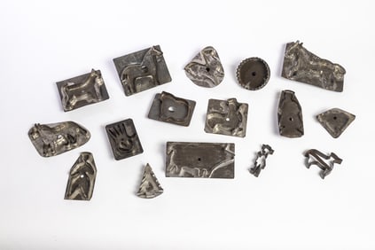 COLLECTION OF SIXTEEN TIN COOKIE CUTTERS