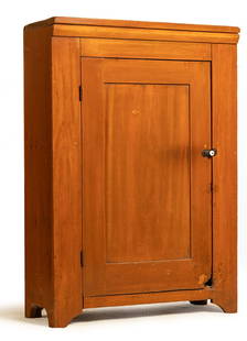 ZOAR, OHIO CUPBOARD: Mid-19th century, poplar. Single paneled door. 47" high, 32.75" wide, 13" deep. Provenance: the collection of the late Jo Louise Brown, Zoar, Ohio. Pickup or freight shipping is required for this