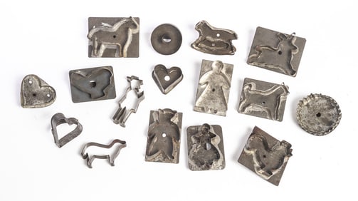 COLLECTION OF SIXTEEN TIN COOKIE CUTTERS