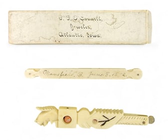 TWO FOLK ART CARVED BONE TOOTHPICS