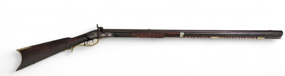NATIONAL ROAD SCHOOL FULL-STOCK RIFLE: Possibly James Teaff Jr. (b. 1827), Steubenville, mid-19th century. Full curly stock, 41" octagonal barrel, approx. 40 cal., elaborate brass patch box. 55" long overall. See Hutslar, Ohio Gunsmiths &