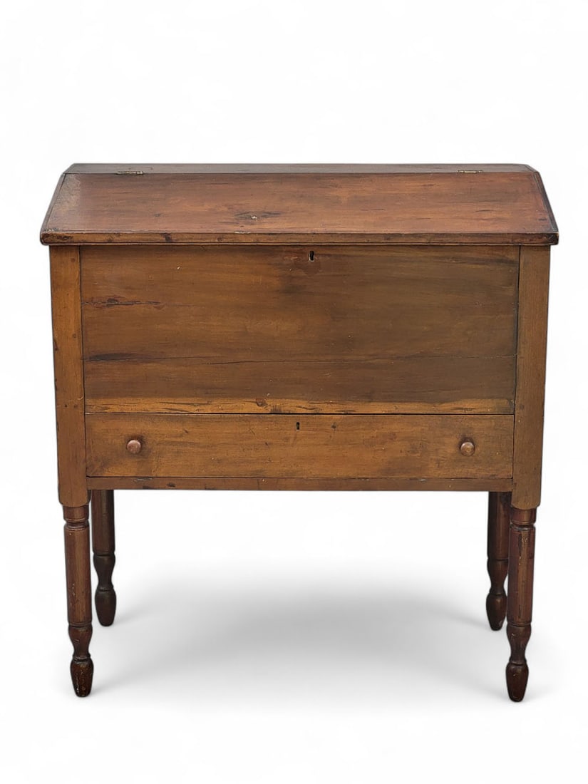 KENTUCKY SLANT-LID SUGAR CHEST / DESK: 1830-1840, cherry and poplar. On high turned legs. 40.5" high, 37.5" wide, 17.5" deep. Provenance: a Midwestern collector
