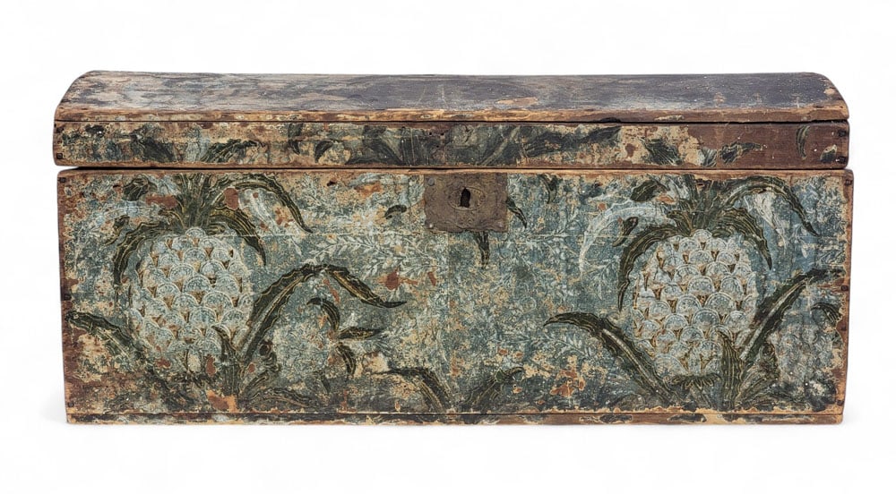 DAYTON, OHIO WALLPAPER BOX: c. 1834. Dometop box covered in block-printed wallpaper with pineapples on a blue ground; and the interior lined with a January 1834 issue of the Dayton Whig and Miami Democrat. 13.5" high, 29.75" wid