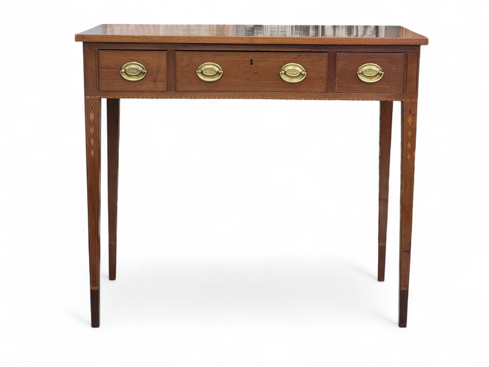 INLAID HEPPLEWHITE CONSOLE TABLE: Probably Southern, early 19th century, mahogany and poplar. Inlaid with various designs of stringing and banding on top, drawer fronts, legs, and around case base. Oval brass pulls with oak-leaf-and-a