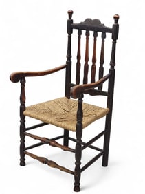 DATED BANNISTER-BACK ARMCHAIR