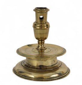 EARLY BRASS CAPSTAN CANDLESTICK