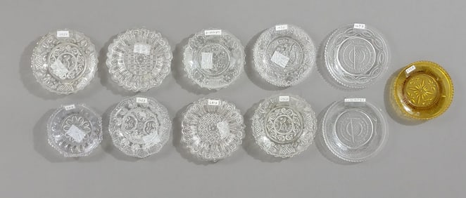 COLLECTION OF PRESSED LACY GLASS CUP PLATES