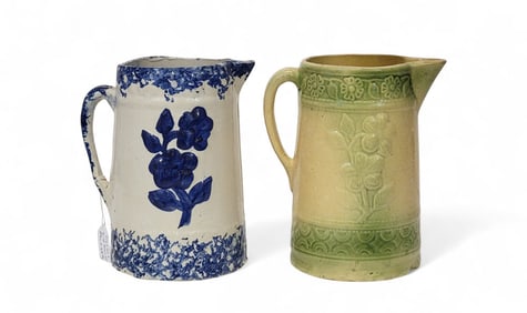 TWO MOLDED PITCHERS, "COSMOS WILDFLOWER"