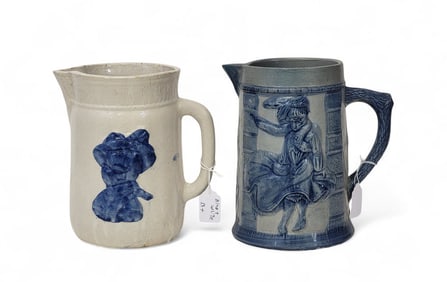 TWO MOLDED STONEWARE PITCHERS