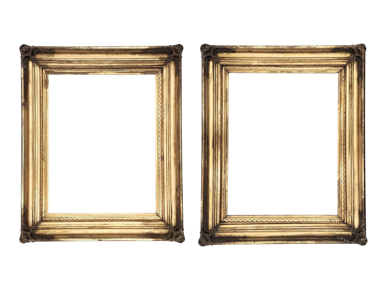PAIR OF VERY GOOD GILT FRAMES: American, 2nd quarter-19th century. 36" high, 29.5" wide; openings are 26.25" high, 20.25" wide. Provenance: an Ohio collection. Affordable, in-house shipping is available for this lot. Please contact