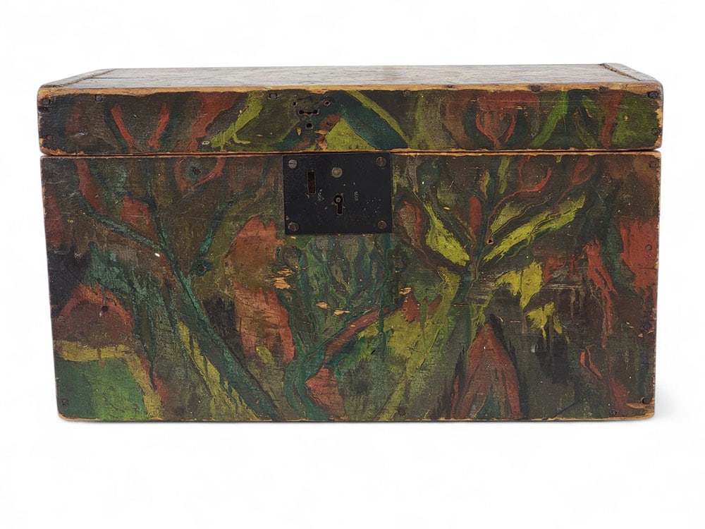 SMALL FOLK ART PAINTED CHEST: American, early 19th century, pine.Rectangular box painted in shades of green and red. Abstract foliate designs on sides, with large "bulls-eye" on lid. Iron plate escutcheon, iron hinges, cut nails, 