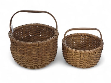 PAIR OF SPLINT WOVEN BASKETS