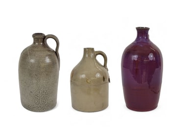 TWO STONEWARE JUGS AND A VASE