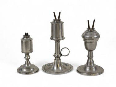 THREE PEWTER OIL LAMPS