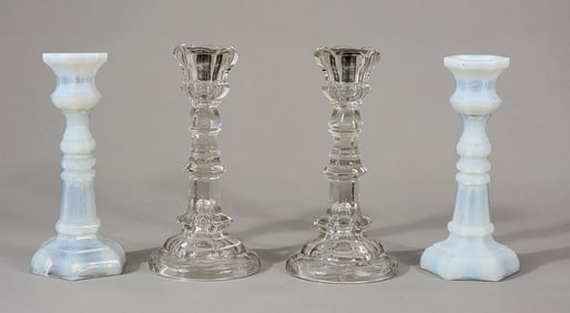 TWO PAIRS OF GLASS CANDLESTICKS