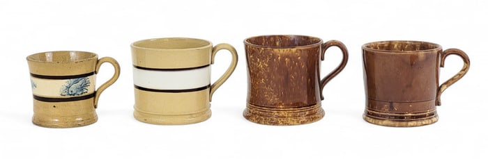 FOUR YELLOW WARE MUGS
