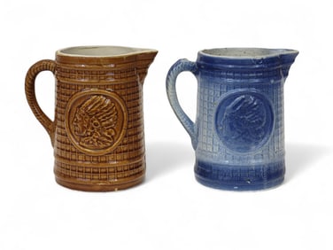 TWO MOLDED "INDIAN CHIEF" PITCHERS