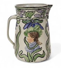 UNUSUAL MOLDED STONEWARE PITCHER