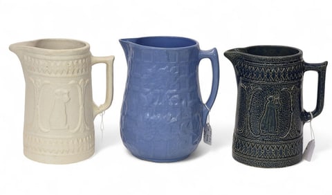 THREE MOLDED PITCHERS: LADY WITH LYRE