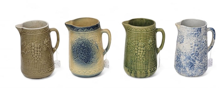 FOUR MOLDED "WAFFLE WITH GRAPES" PITCHERS