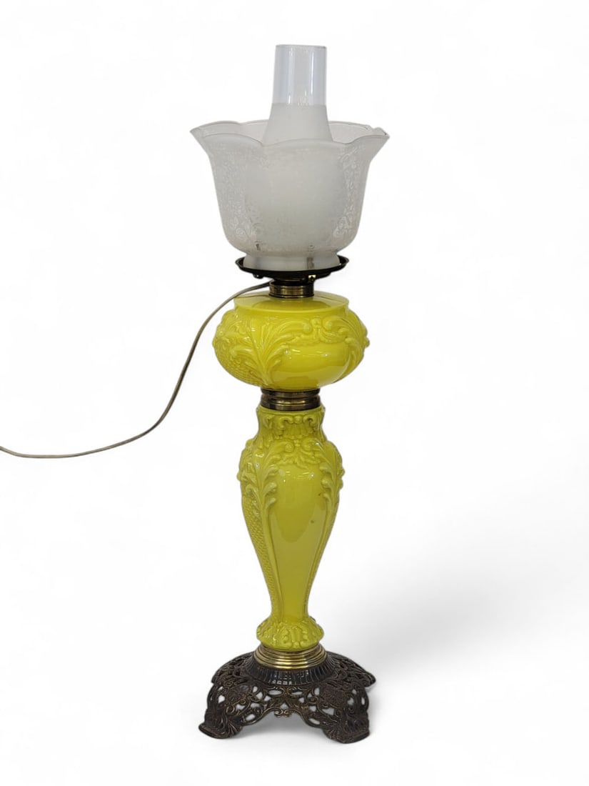 CANARY-YELLOW GLASS BANQUET LAMP: Consolidated Lamp and Glass Co, Pennsylvania, c. 1895. Bright canary yellow glass column and font molded with acanthus leaves, daisies, and hobnails in "Monastic" pattern, with cast bronzed base and t
