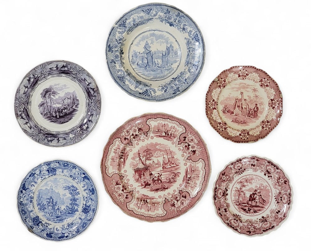 SIX STAFFORDSHIRE TRANSFER-PRINTED PLATES: English, 19th century. Includes a light blue Gondola soup plate, 9.5" diameter; a red Giraffe plate, 7.5" diameter; a purple European view plate, 8.5" diameter; a medium blue romantic plate, 8" diamet