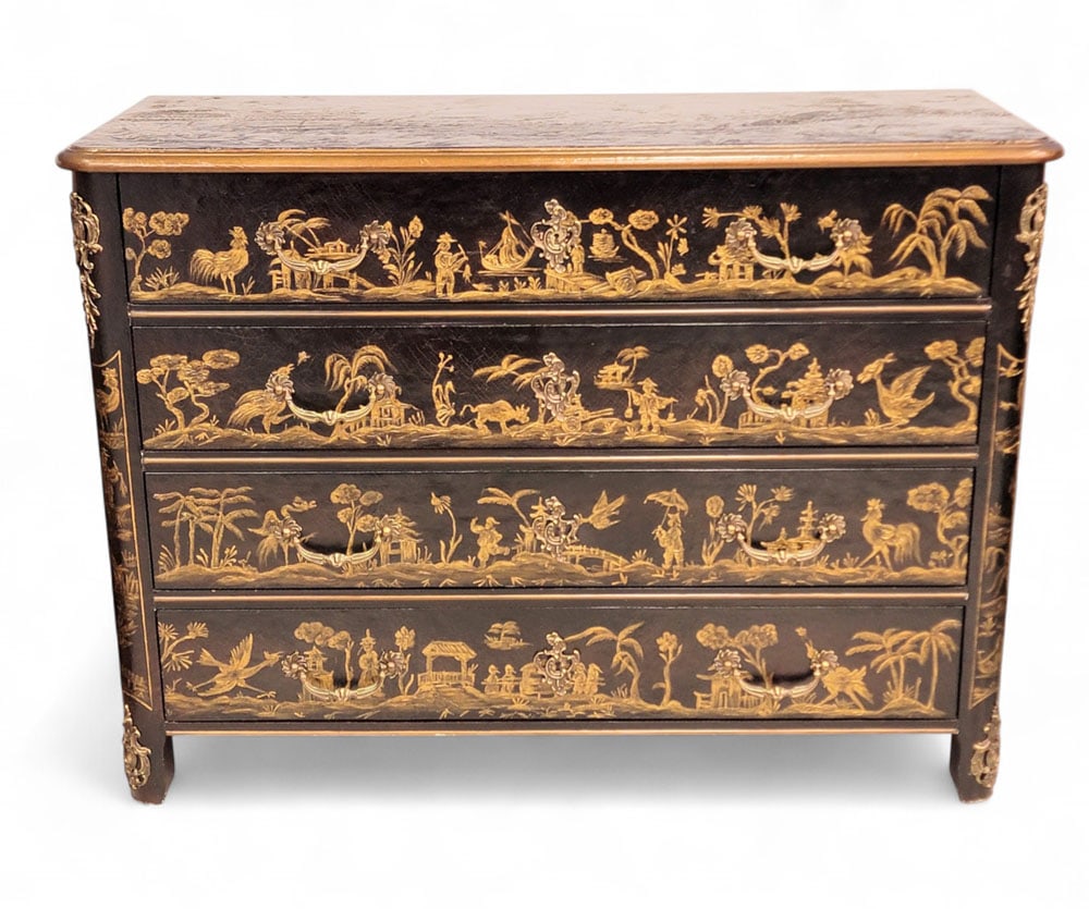 CHINOISERIE CHEST OF DRAWERS BY BAKER FURNITURE: American, 20th century. Marked with a metal Baker Furniture label inside the top drawer. Four-drawers with a black leather-clad top and drawer fronts, each with gilt-painted, low-relief scenes depicti