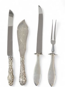 FOUR PIECES OF STERLING SILVER SERVING CUTLERY
