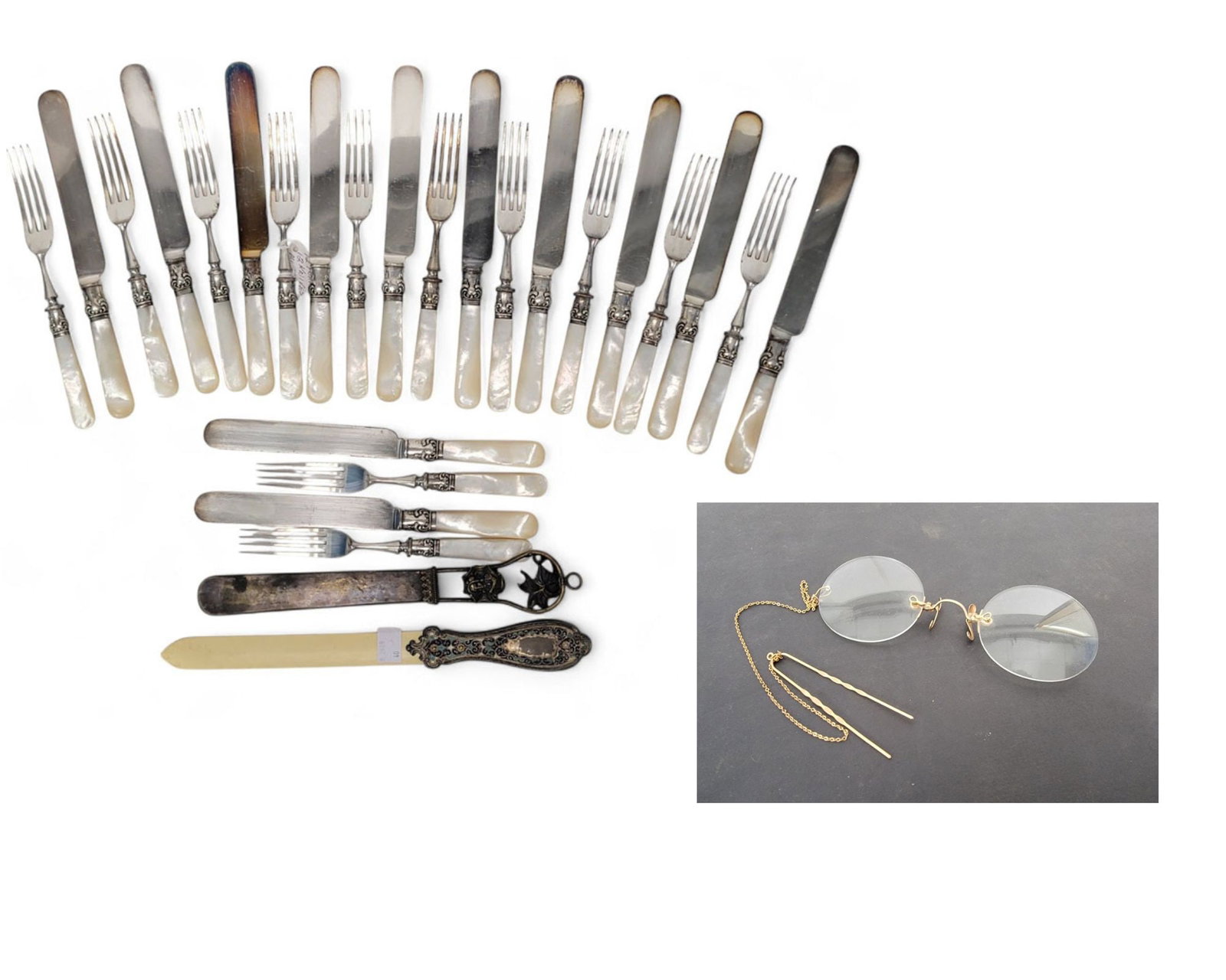 SET OF PEARL-HANDLED FLATWARE, PAPER KNIVES, & PINCE NEZ: 19th century. Set of 12 mother-of-pearl-handled table knives and forks, 9" and 7.75" long; together with two paper knives, one with an enameled handle, 10.25" and 11" long; and a Victorian pince nez, 