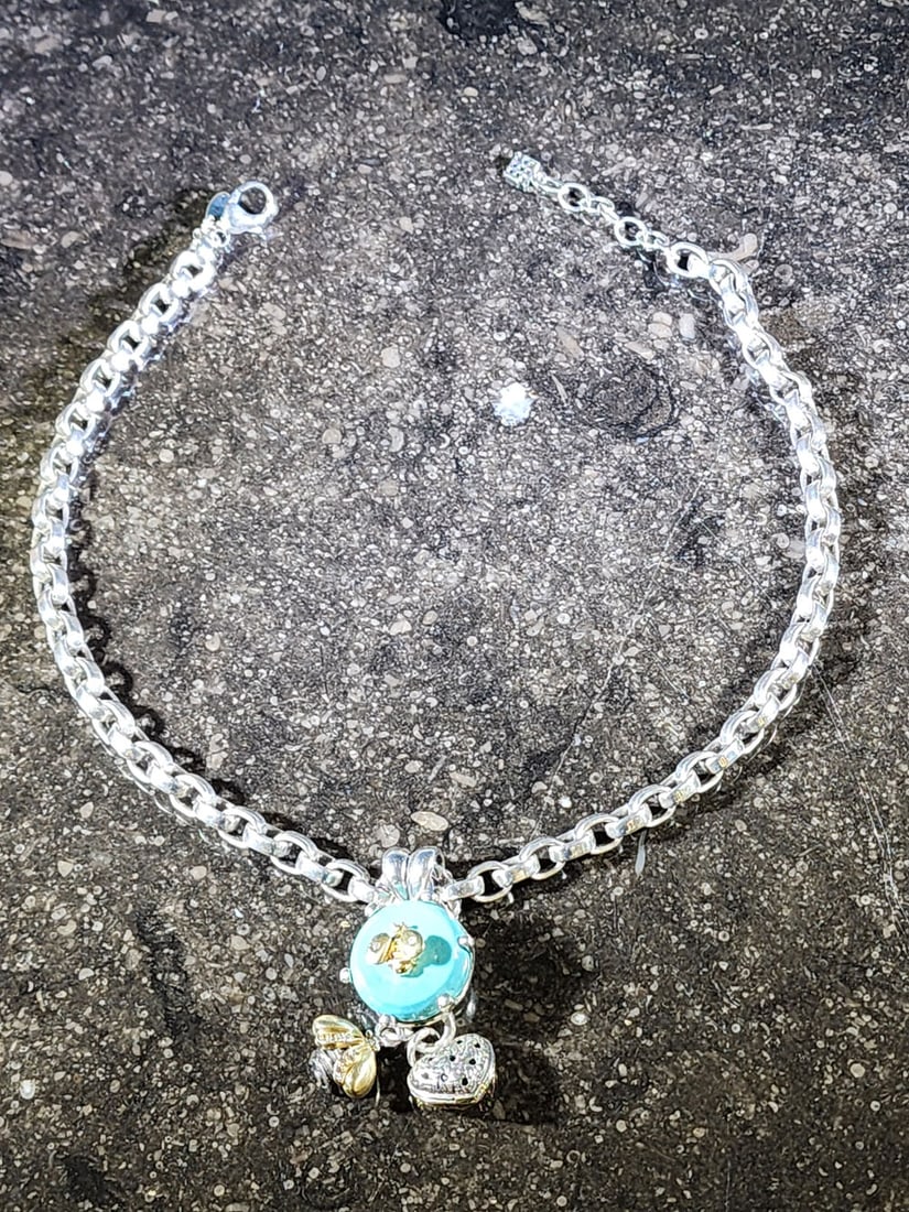 SARAH JANE BEE & HEART NECKLACE: Marked for Saint, 18K, and sterling. Chunky chain with turquoise pendant topped by a yellow gold bee with inset diamonds, and with a gold, silver, and diamond bee below, and a yellow gold heart. 85g.