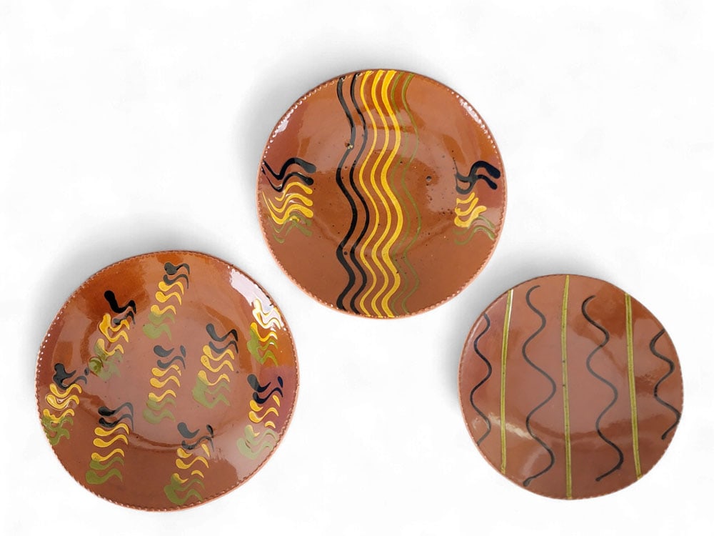 THREE LESTER BREININGER REDWARE PLATES (1 of 6)
