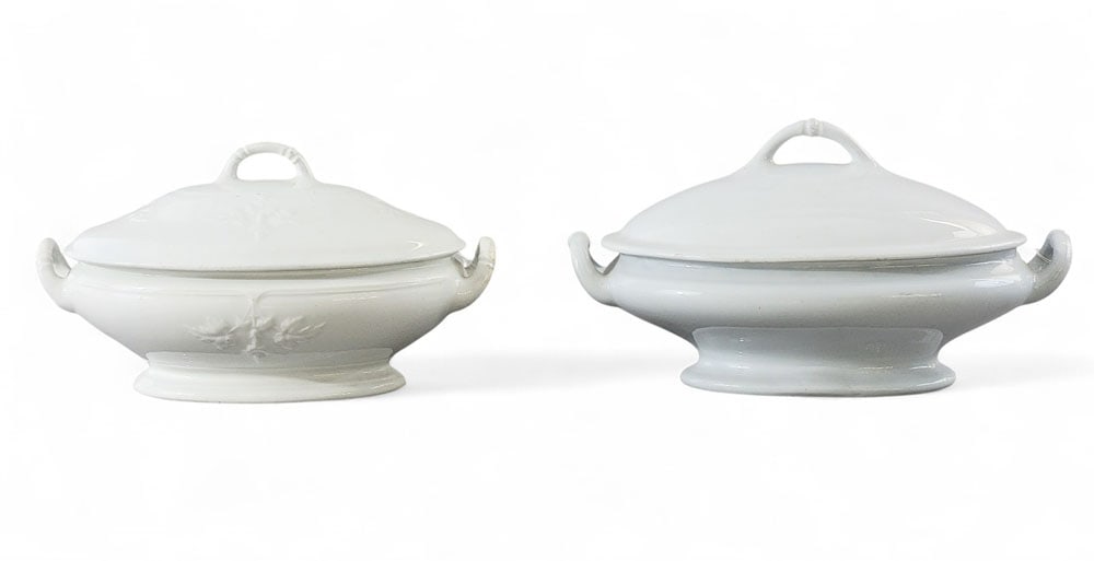 TWO COVERED IRONSTONE TUREENS: English, late 19th century. Two covered ironstone tureens. White tureen molded with leaves on body and lid, marked for Glementson Brothers. 6" high, 10.5" wide. And white tureen with plain body and li