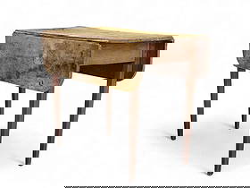 HEPPLEWHITE DROP-LEAF TABLE: New England, early 19th century, birch. Rectangular top and leaves on tapered and molded legs, and retaining its original red paint. 27" high, 36" wide, 10.5" deep (closed), 35" deep (open). Provenanc