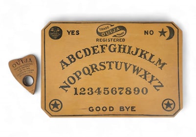 EARLY WOODEN OUIJA BOARD
