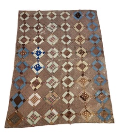 MODIFIED NINE-PATCH QUILT