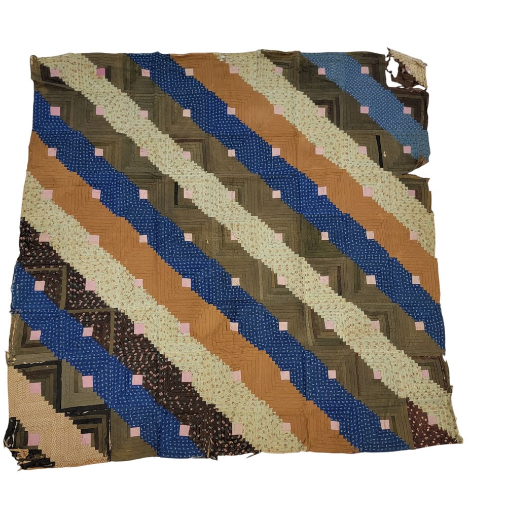 SILK LOG CABIN QUILT TOP: American, 19th century, silk. A log cabin quilt top composed of green, brown, and blue fabrics with pink centers. Hand-stitched. 70" square. Provenance: The Collection of the late Dr. Virginia Gunn, W