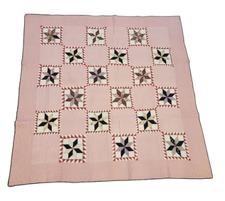EIGHT POINT STAR W/ SAWTOOTH BORDER QUILT