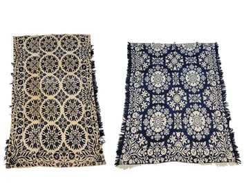 TWO JACQUARD COVERLETS