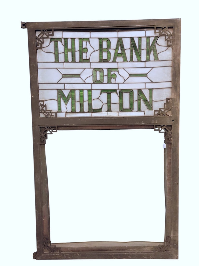 STAINED GLASS BANK CLOCK DIAL SURROUND: O. B. McClintock Company, Minneapolis, Minnesota; made for the Bank of Milton, West Virginia, early 20th century. "THE BANK OF MILTON" in green glass, surrounded by white glass, set it its original fr