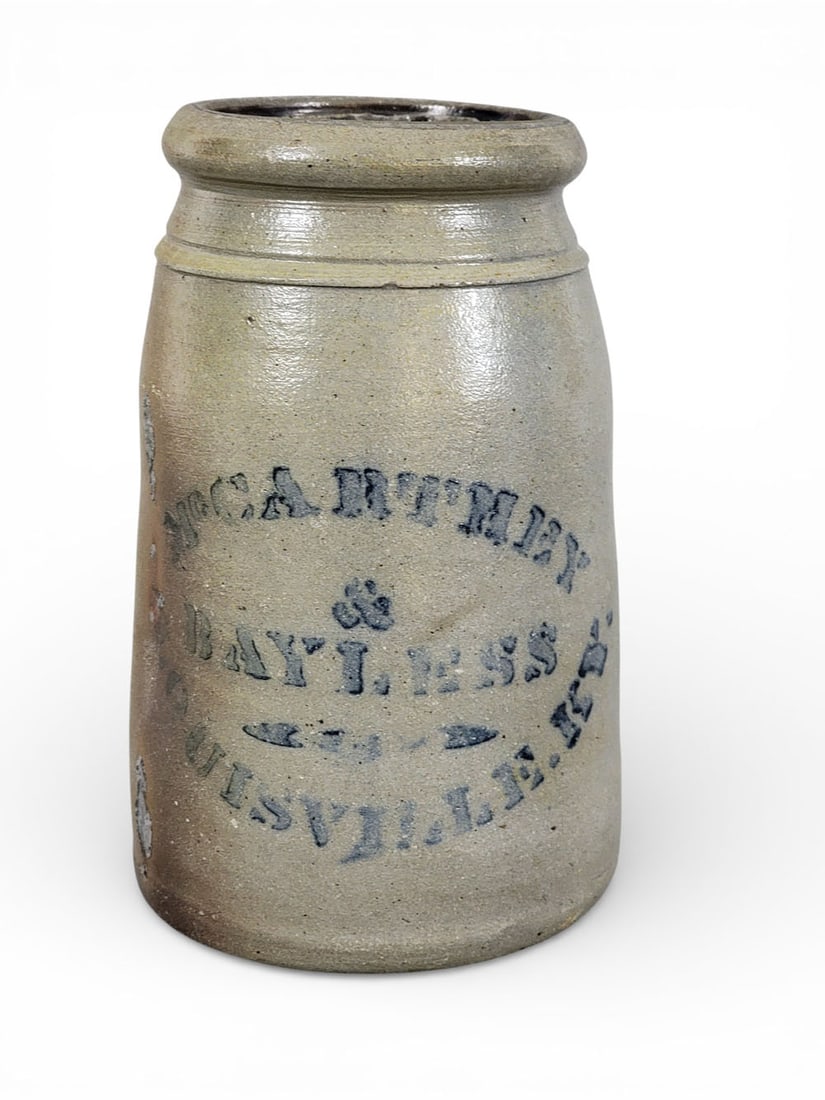 KENTUCKY STONEWARE CANNING JAR: Southwestern Pennsylvania, c. 1875, retailed by Bayless and McCarthey, Louisville. Wax sealer with cobalt stenciled decoration. 8.25" high. Provenance: the collection of the late Dr. Jerry Phelps, Pro