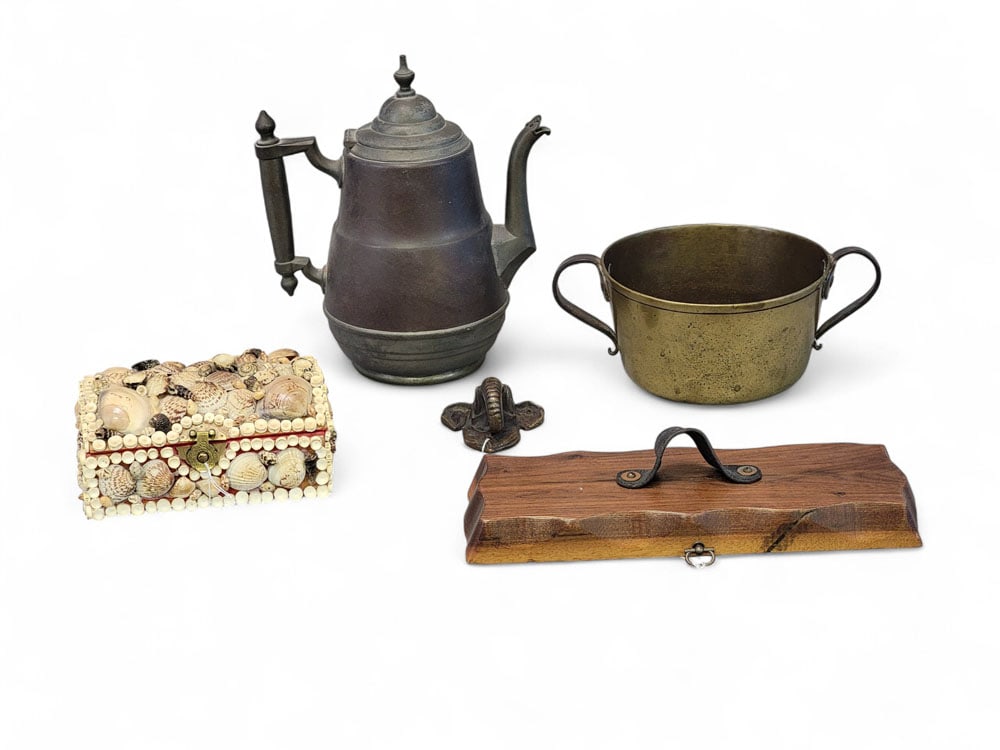 COLLECTION OF METALWARE AND FOLK ART: American, mixed dates, mixed materials. A collection of metalware and folk art. A small but heavy bell metal pot with wrought iron strap handles. A pewter and iron coffee pot with copper base, stamped