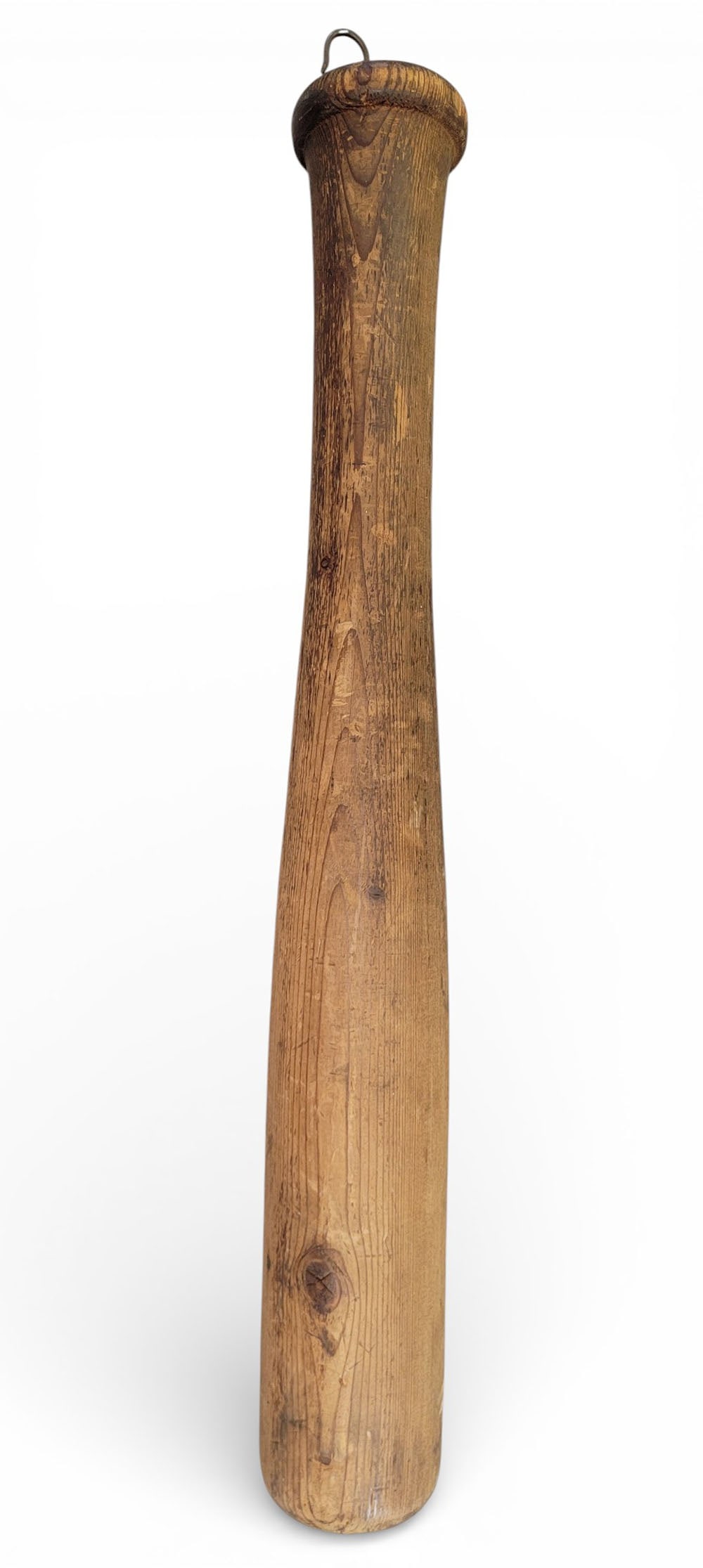GIANT WOODEN BASEBALL BAT TRADE SIGN: American, 1890-1910, pine. A giant wooden baseball bat, likely a trade sign for a sporting goods store. 38" long, 5.5" diameter. The shape of the hand grip and the knob indicate the early date. Proven
