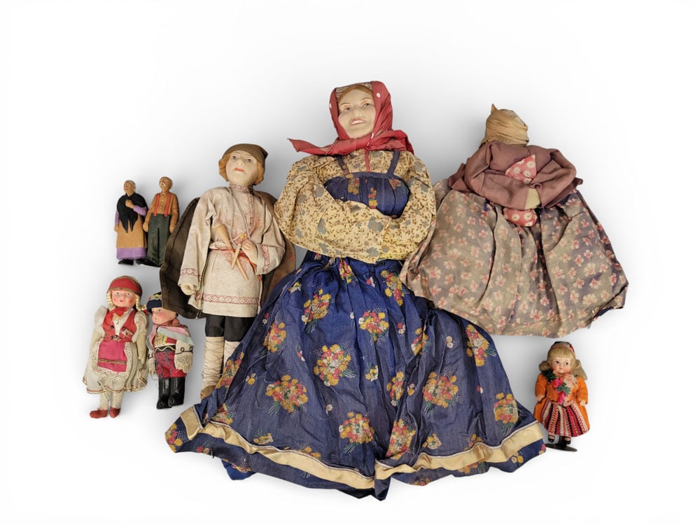 GROUP OF EASTERN EUROPEAN ETHNOGRAPHIC/SOUVENIR DOLLS: Eastern European, 19th-20th centuries. A group of eight Eastern European ethnographic dolls including two Soviet tea cozies, a Soviet peasant boy, as well as small German and Swedish girls and a Czech